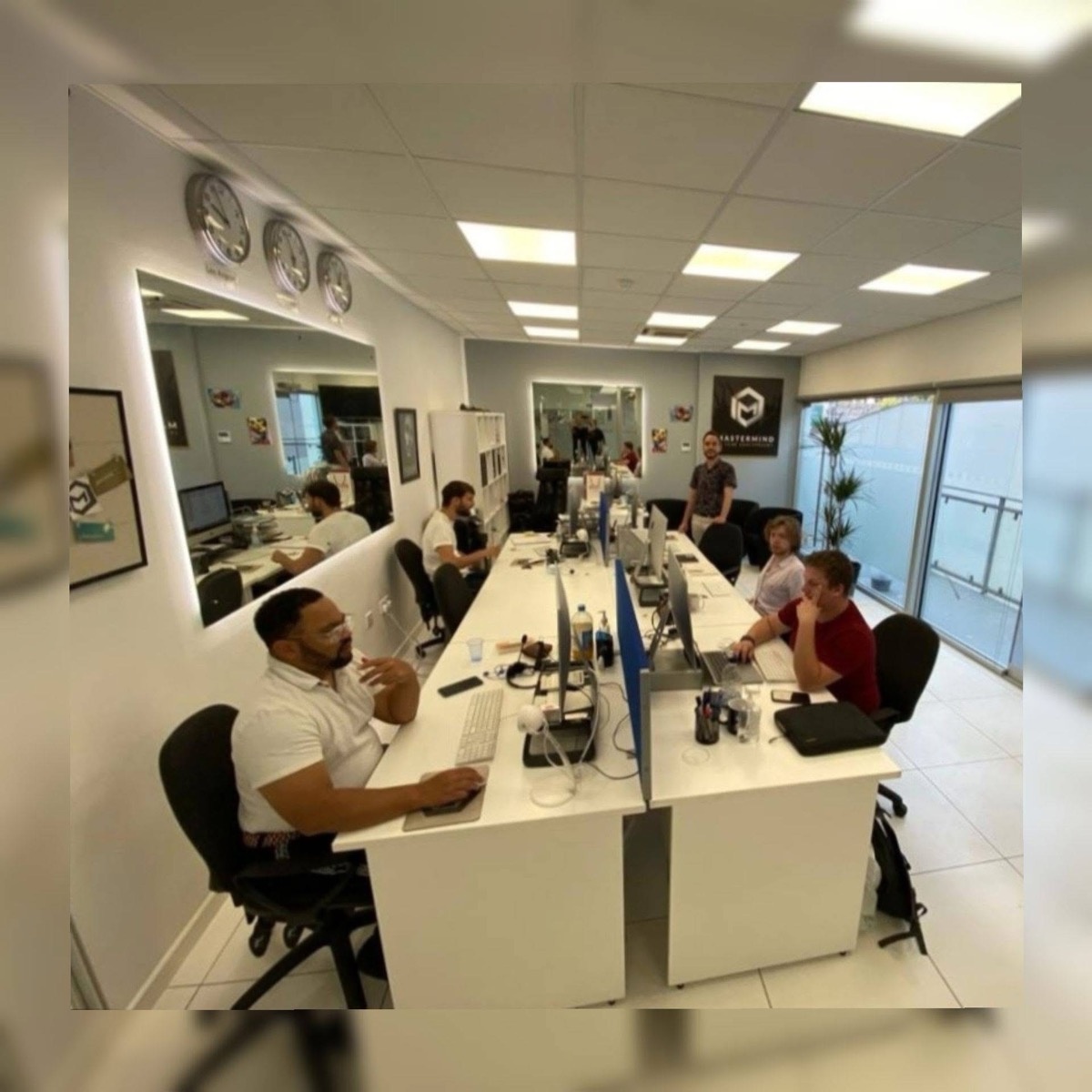 Mastermind Promotion office with full team